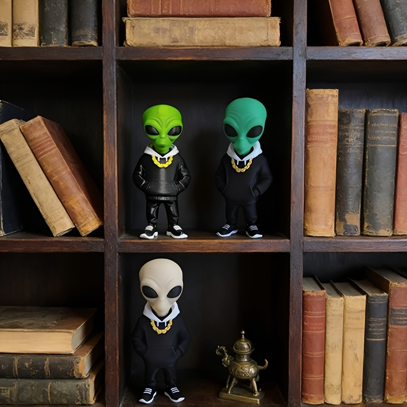 1 figurine d'alien verte avec  - Desk Setup Design avis et prix