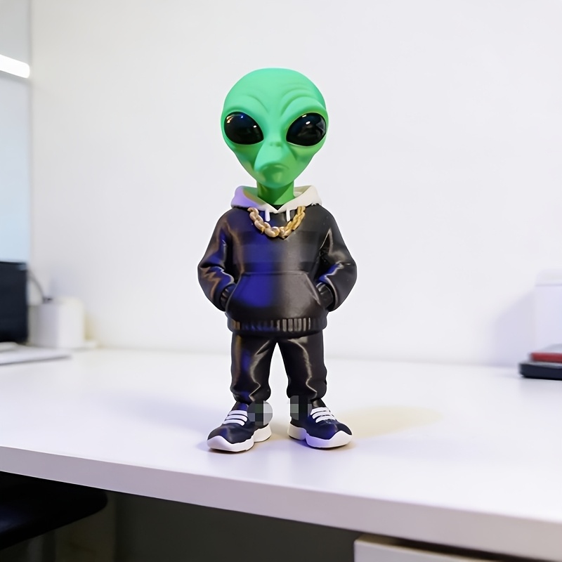 1 figurine d'alien verte avec  - Desk Setup Design avis et prix